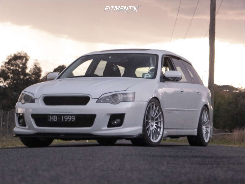 White 2005 Subaru Legacy GT Limited with Enkei RS05-RR wheels, Michelin Pilot Sport 4 tiers, and BC Racing coilovers
